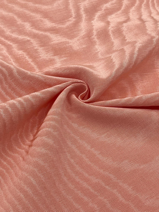 Close-up of Moiré Kutnu showing geometric patterns and shimmering effect