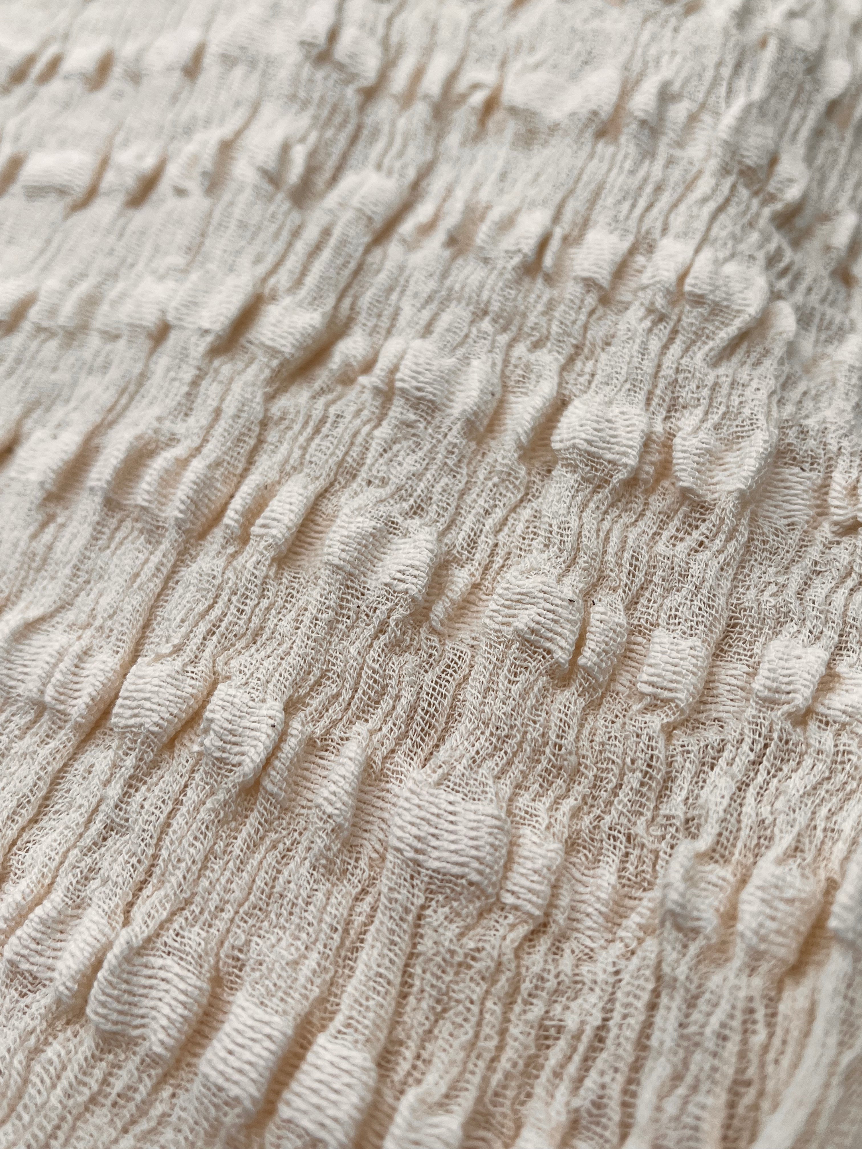 Neutral Textured Cotton Stretchy Crinkle Fabric.