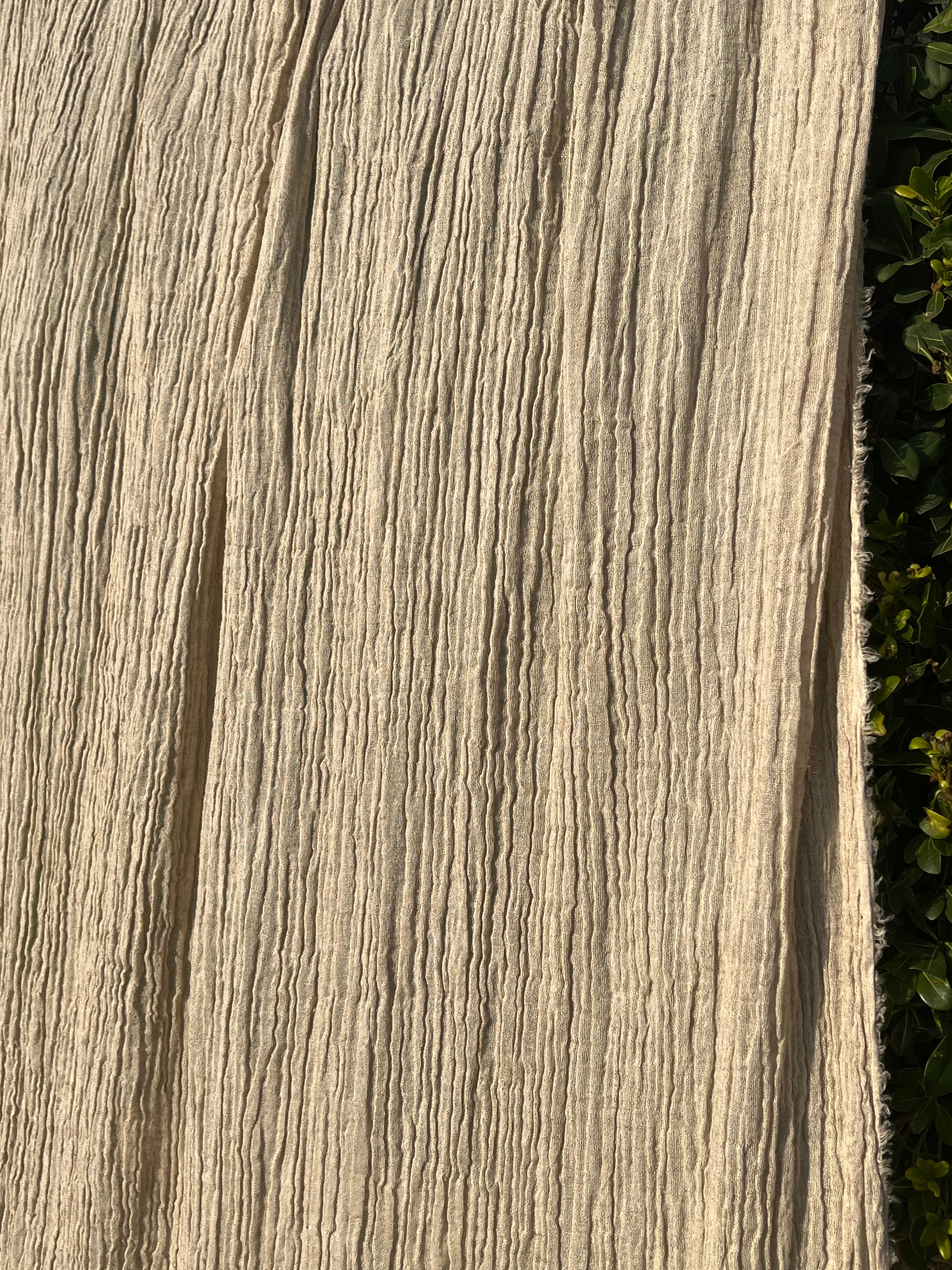 Neutral Stretchy Crinkle Linen Fabric, Textured Surface.