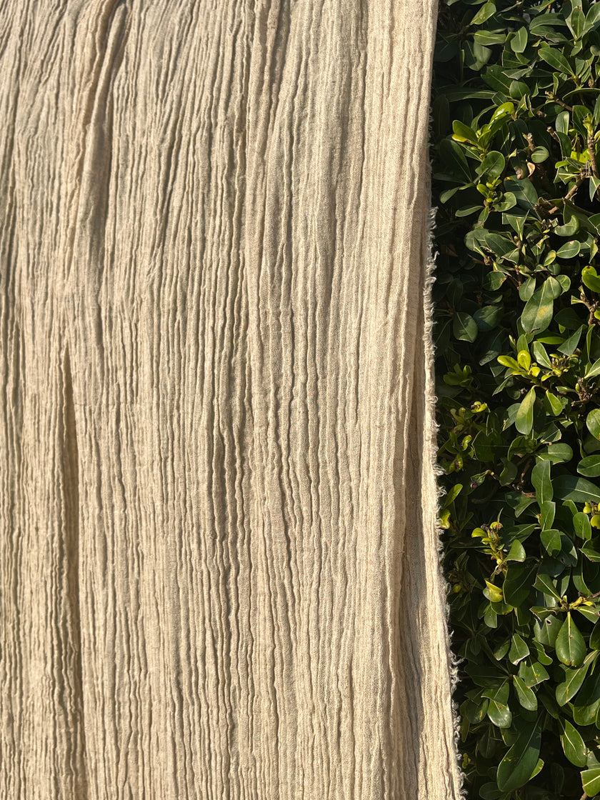 Neutral Stretchy Crinkle Linen Fabric, Textured Surface.