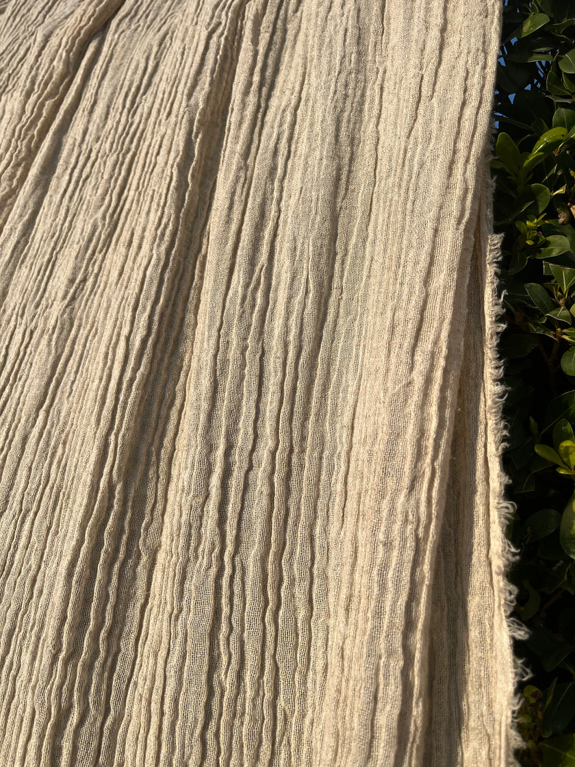 Neutral Stretchy Crinkle Linen Fabric, Textured Surface.
