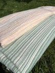 Muslin Fabric Green-Pink Shades Pin Stripes With Glitter.