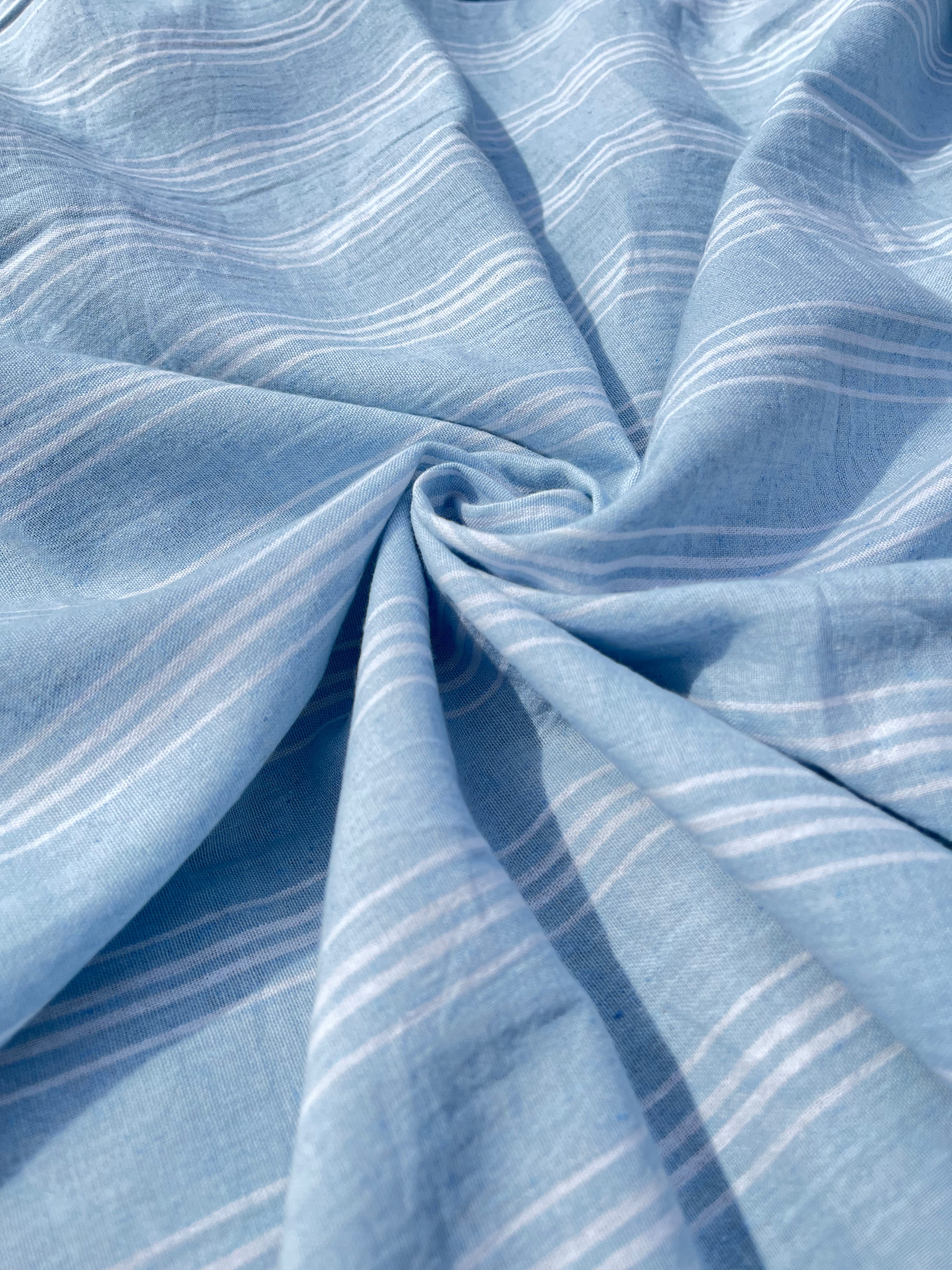 Cotton Light Weight Blue Yarn Dyed Fabric With Pin Stripes.