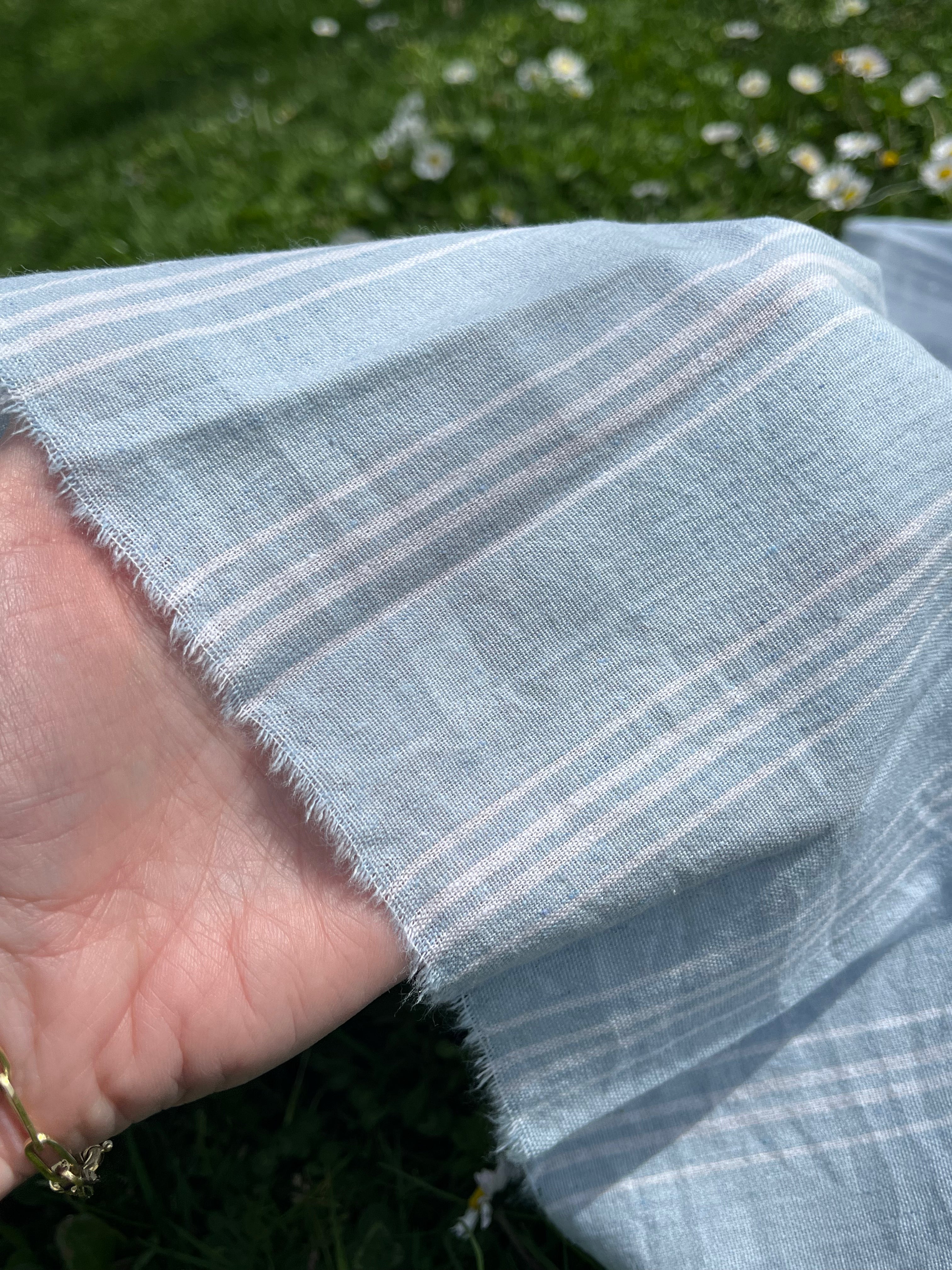 Cotton Light Weight Blue Yarn Dyed Fabric With Pin Stripes.