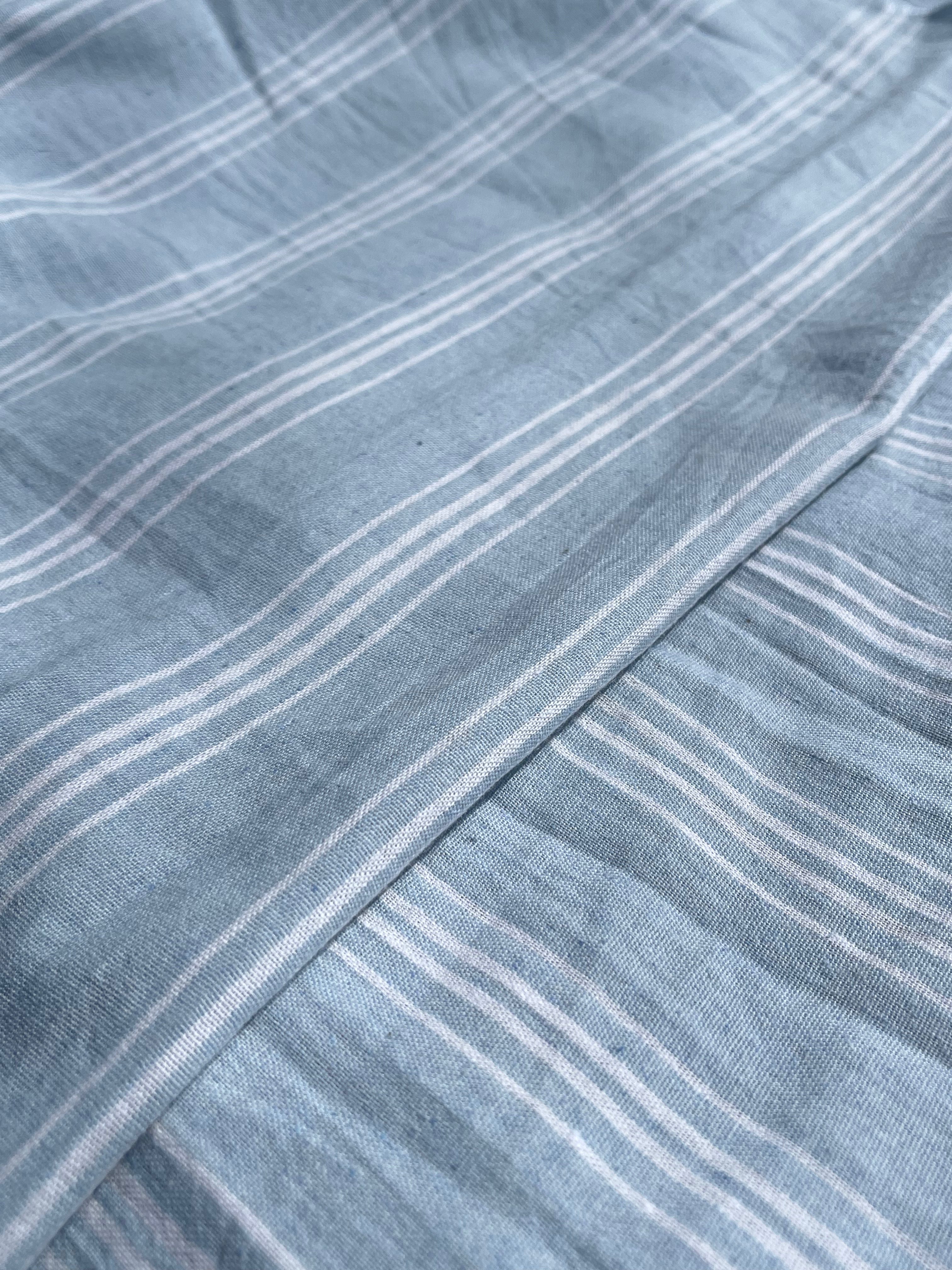Cotton Light Weight Blue Yarn Dyed Fabric With Pin Stripes.
