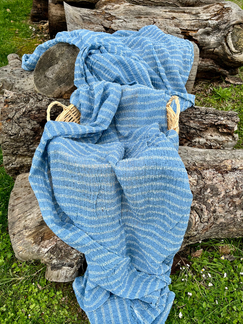 Indigo Blue Textured Sheer Linen Fabric With White Stripes.