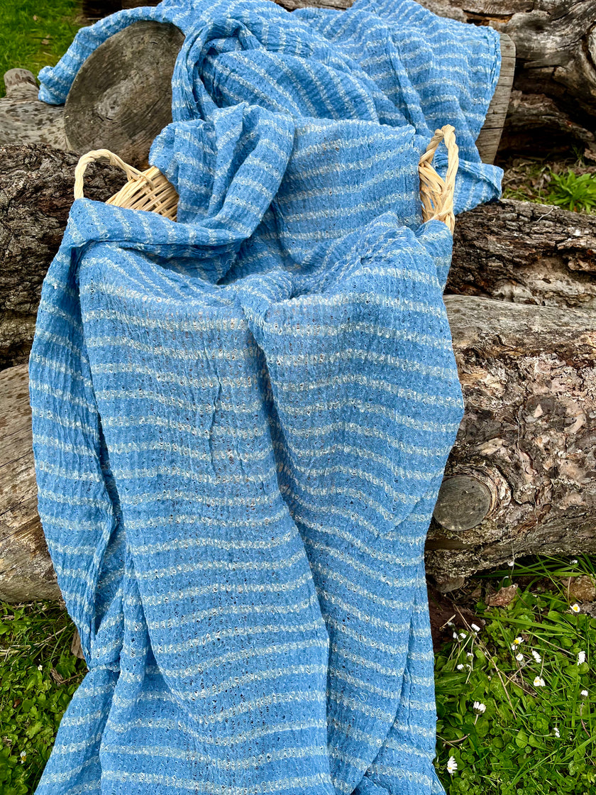 Indigo Blue Textured Sheer Linen Fabric With White Stripes.