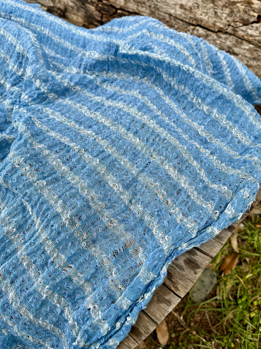 Indigo Blue Textured Sheer Linen Fabric With White Stripes.