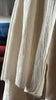 Tissu de gaze froissé de couleur ivoire neutre non blanchi, tissu Sile. Tissu Sile.