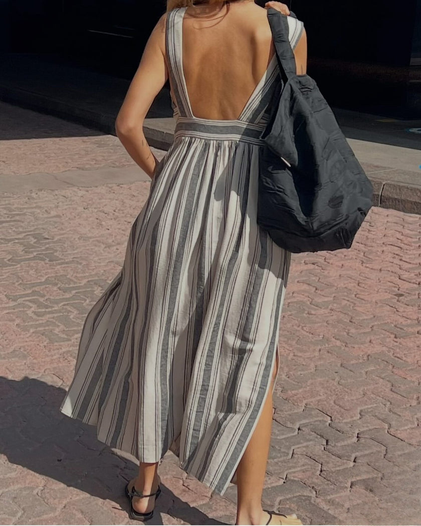 Tissu naturel en gaze de coton à rayures noires.